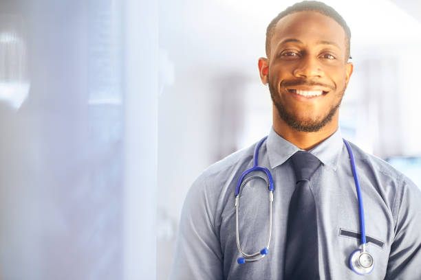 istock Junior doctor smiling to camera in hospital 654341578