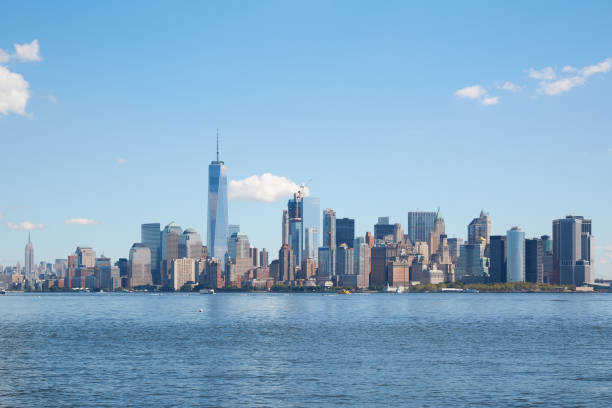 New York city skyline view in a clear day, blue sky New York city famous skyline view in a clear day, blue sky liberty tower stock pictures, royalty-free photos & images