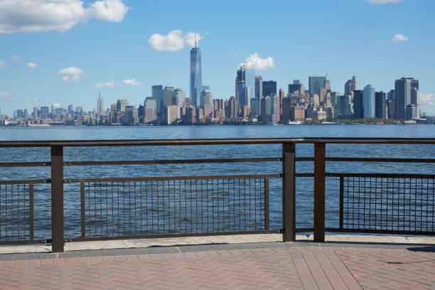 istock New York city skyline view from empty dock terrace in a sunny day 654341924