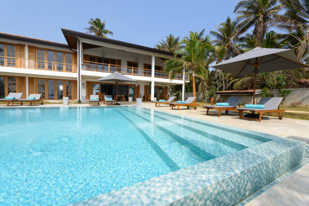 istock Empty outdoor swimming pool on tourist resort 654350108