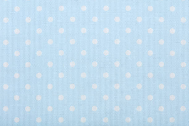 istock Pastel blue polka dot fabric macro, texture background 654353026