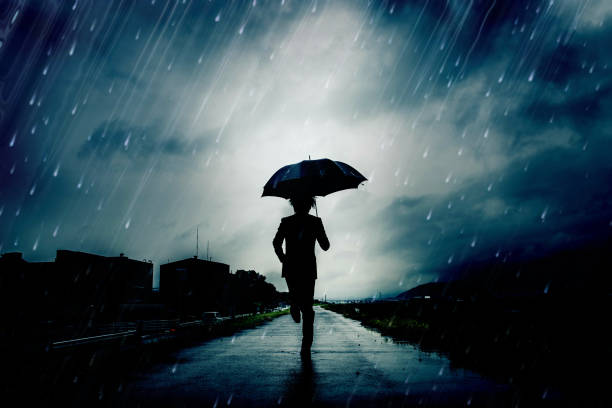 istock Man running in the rain 654353456
