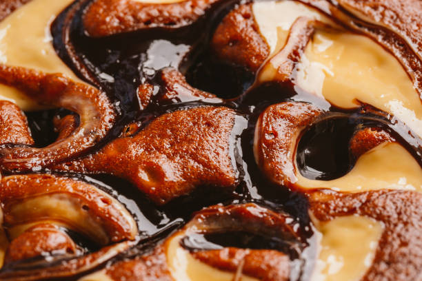 istock cake with truffle and caramel stuffing close-up 654375610