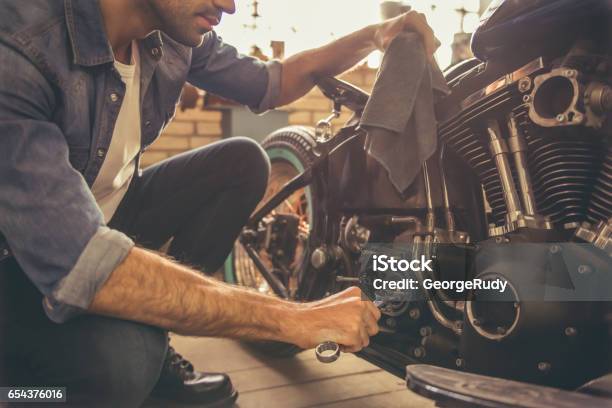 Motorbike Repair Shop Stock Photo - Download Image Now - Motorcycle, Repairing, Care
