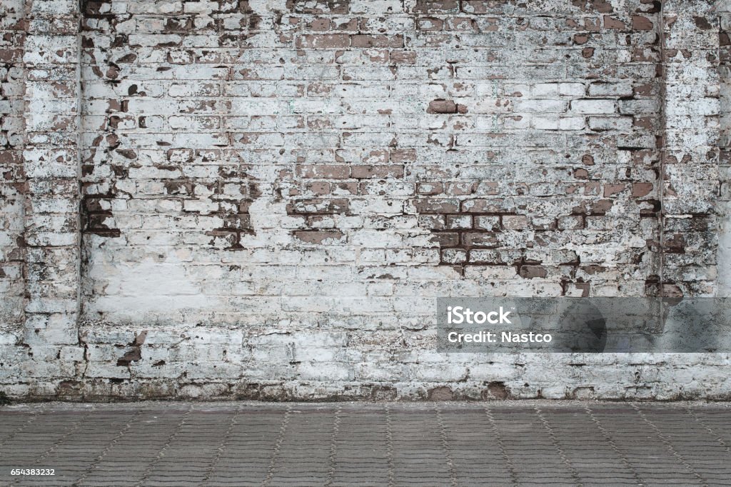 Urban background Urban background, white ruined industrial brick wall with copy space Wall - Building Feature Stock Photo
