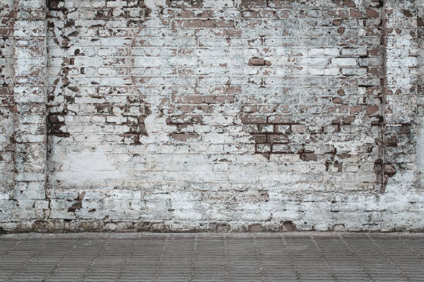 Urban background Urban background, white ruined industrial brick wall with copy space old style stock pictures, royalty-free photos & images