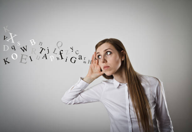 istock Curious girl in white is eager to know all the gossip 654385896