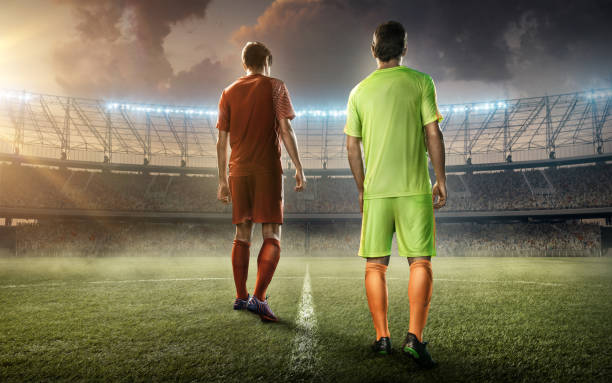 istock two soccer players on a soccer playground 654385936