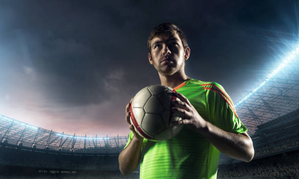 istock soccer player with a ball 654385998
