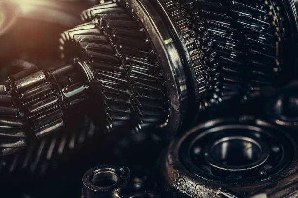 primer plano de metal ruedas de engranajes - gearshift fotografías e imágenes de stock