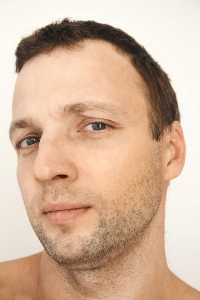 istock Caucasian man portrait over white wall 654394800
