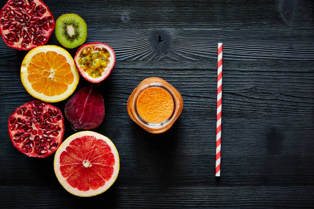 variety of sliced fruit and freshly pressed juice