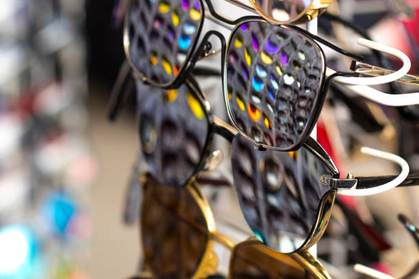 istock Sunglasses in which other glasses of different colors are displayed 654404692