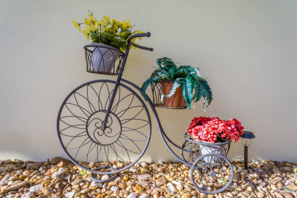 istock Bicycle with Flower Pots and Rocks 654410596