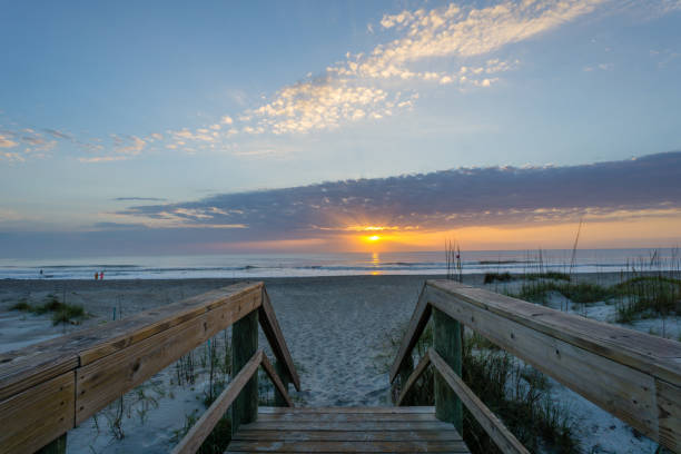 istock Sunrise on the Beach from Walkway 654410768
