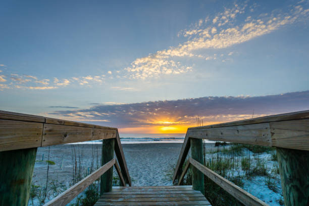 istock Sunrise on the Beach from Walkway 654410782