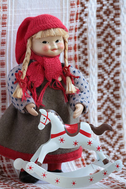 istock little puppet with rocking horse 654414784