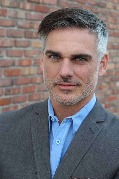 istock Man with salt and pepper hair close-up 654431756
