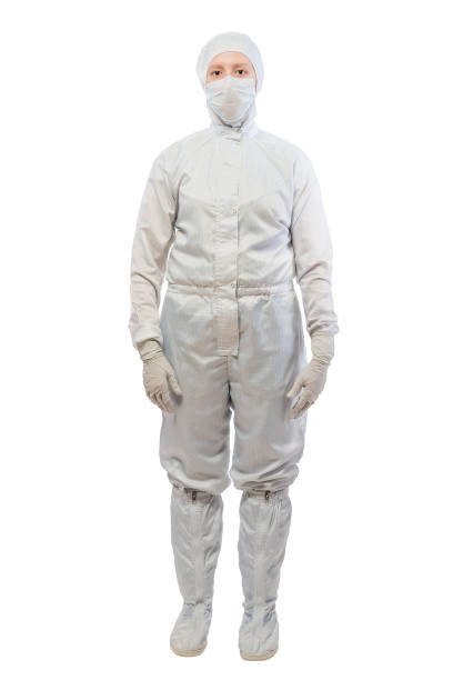 istock chemist in a white protective suit in full length isolated 654440144