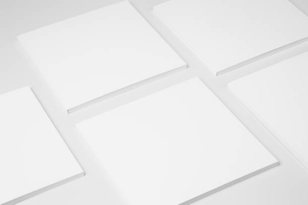 istock Real paperback white books on a gray background 654443506