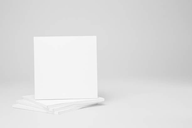 istock Real paperback white books on a gray background 654443558