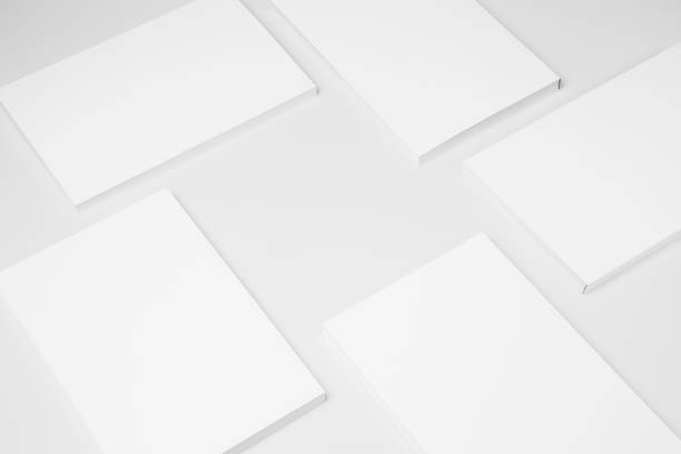 istock Real paperback white books on a gray background 654443798