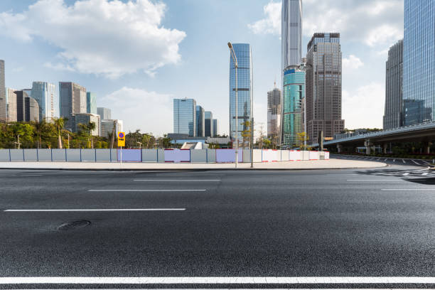 istock urban traffic with cityscape 654459512