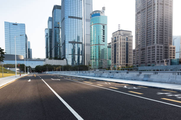 istock urban traffic with cityscape 654466364
