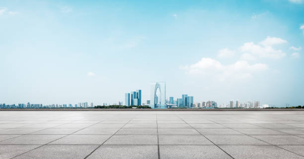 istock empty brick floor and cityscape of modern city 654472282