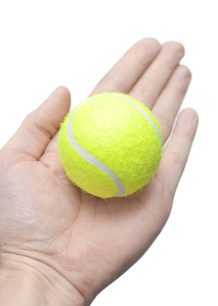 istock Tennis Ball in Hand 654473102