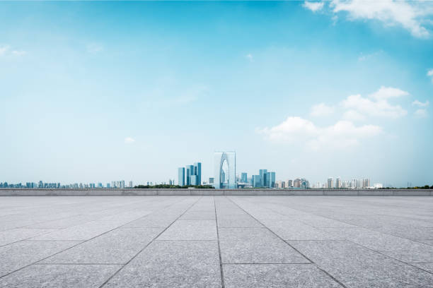 istock empty brick floor and cityscape of modern city 654477464