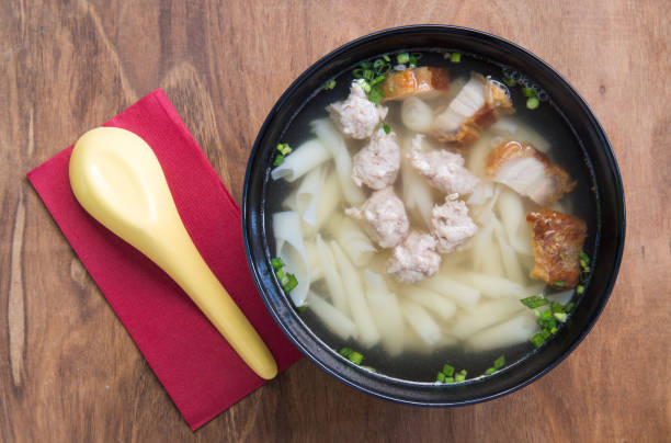 istock Pork noodle soup on wooden table 654481818