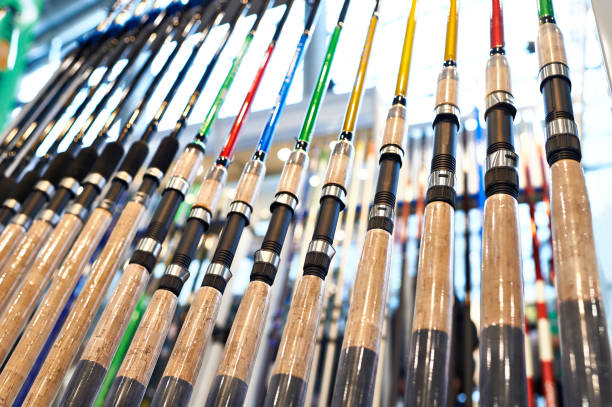 Fishing spinnings in store Fishing spinnings in the store fishing tackle stock pictures, royalty-free photos & images
