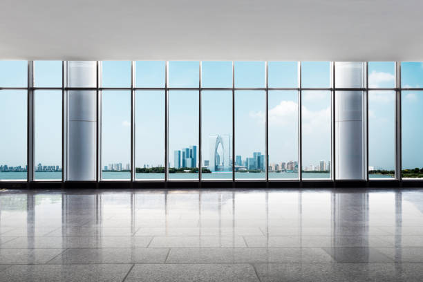 istock empty floor and cityscape of modern city from window 654490438