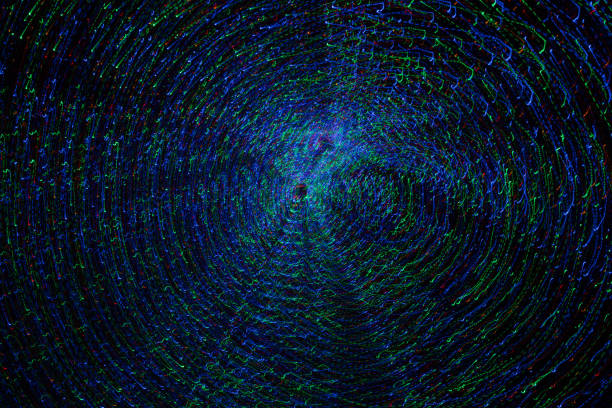 istock Abstract colorful swirl shape on black background 654503100