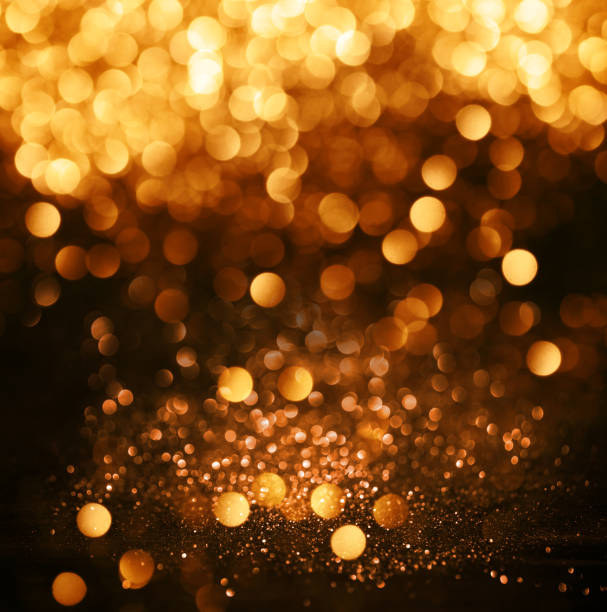 istock glitter lights grunge background, glitter defocused abstract Twinkly Lights and glitter Stars Christmas light Background. 654512882