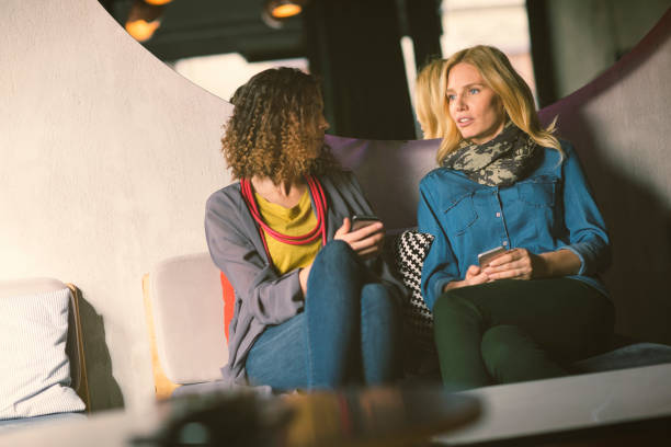 istock Female friends in cafe 654544082