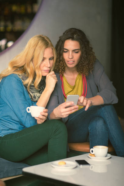 istock Female friends in cafe 654544332