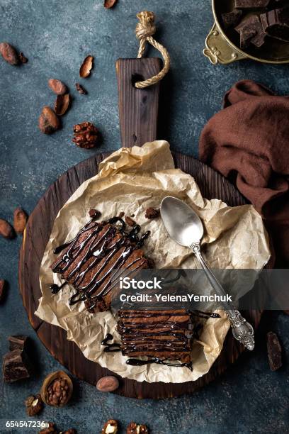 Chocolate Brownie Cake Dessert With Nuts On Dark Background Directly Above Flat Lay Stock Photo - Download Image Now