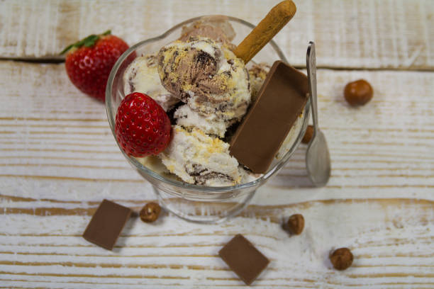 istock Ice Cream in a bowl on wooden background 654547552
