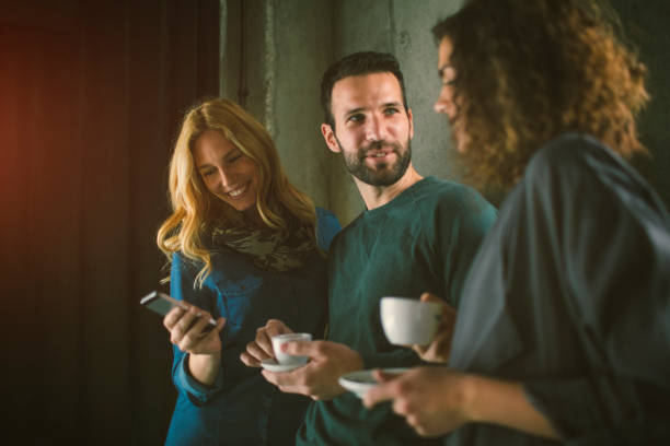 istock Mid adult friends in cafe 654552486
