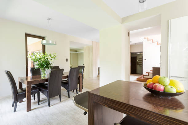 istock Modern shape of a luxurious dining room in travertine 654555964