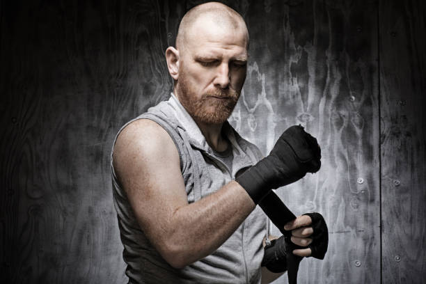 istock Redhead Middle Aged Man in Boxing Stance 654563926