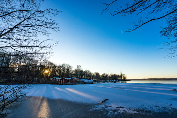 istock pier on a snow covered lake in winter 654570474