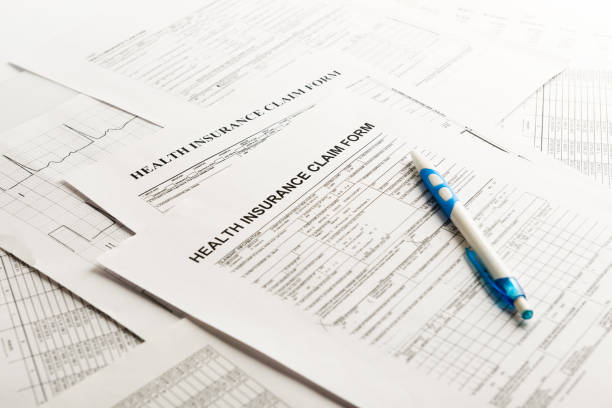 istock health insurance form, paperwork and questionnaire for insurance concepts 654573734