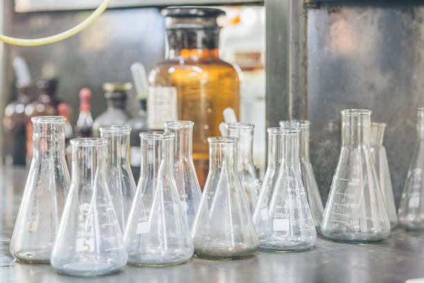 istock Beakers and equipment on table in factory laboratory 654573934