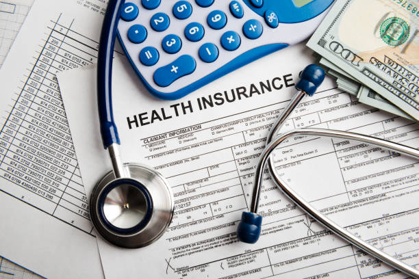 istock Health insurance application form with banknote and stethoscope concept for life planning 654573962
