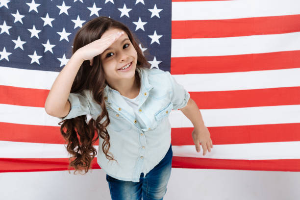istock Artistic little girl posing in the studio 654574020