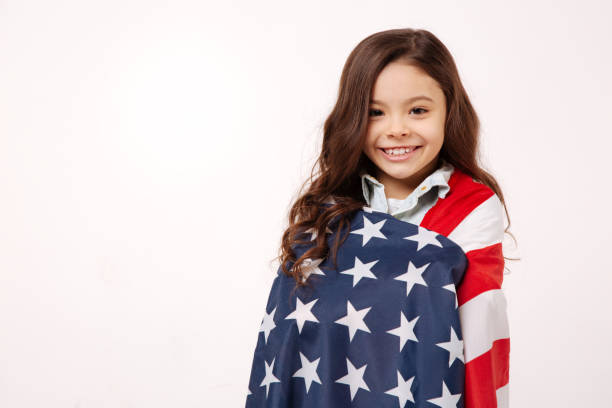 istock Exciting little girl expressing happiness in the studio 654574110
