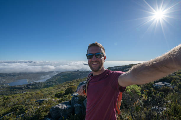 istock Young man in Cape Town taking selfie portrait 654574850